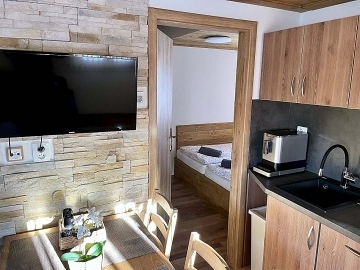 Chaty a penzion - wellness a baz�n - p�ehrada Lipno